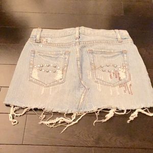 Denim distressed mini skirt